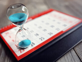 Redis 8.8 cache tier cutting time to result for distributed PostgreSQL query performance in SaaS platforms - hourglass on calendar symbolizing query latency and TTL-based caching